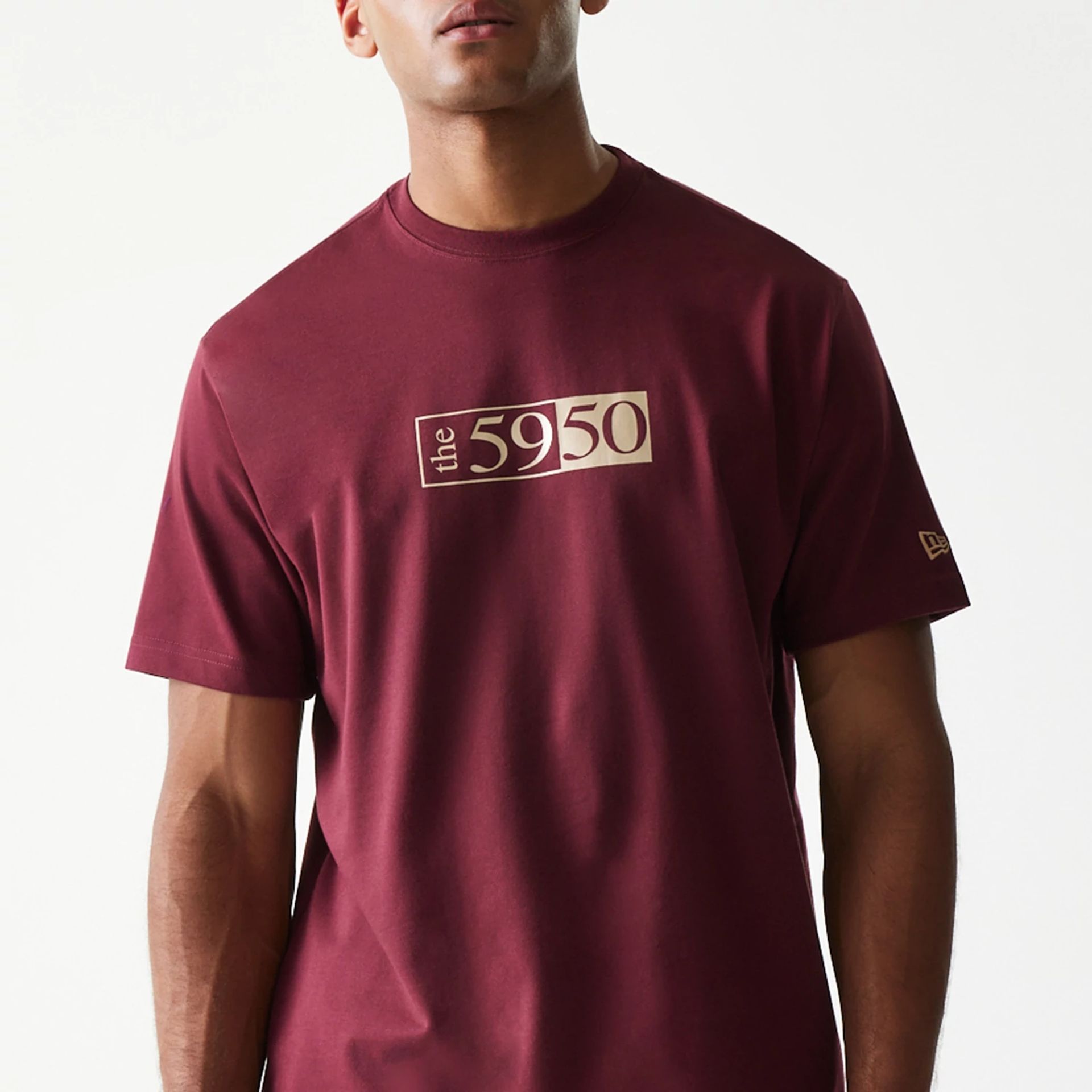 The Male model is wearing A-Frame 59FIFTY Fitted Cap Description Dark Red T-Shirt 3