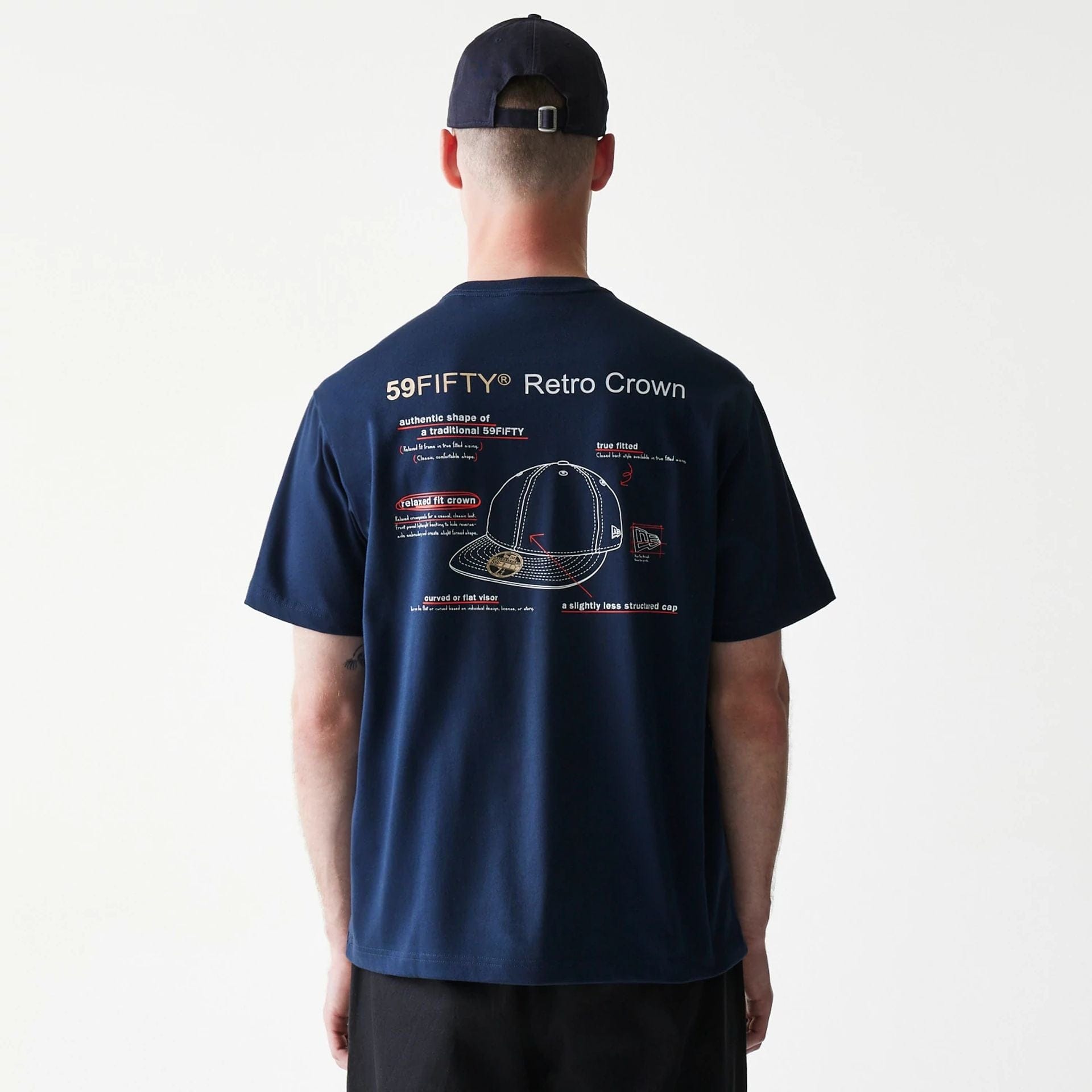 The Male model is wearing Retro Crown 59FIFTY Fitted Cap Description Navy T-Shirt 2
