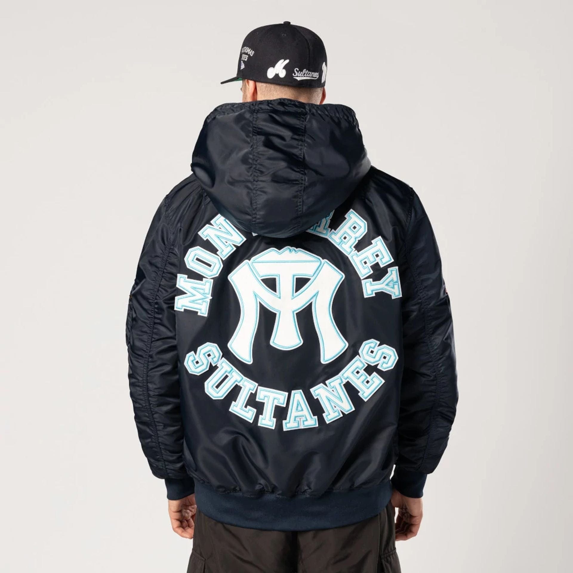 The Male model is wearing Sultanes De Monterrey LMB X Alpha Navy Jacket 2