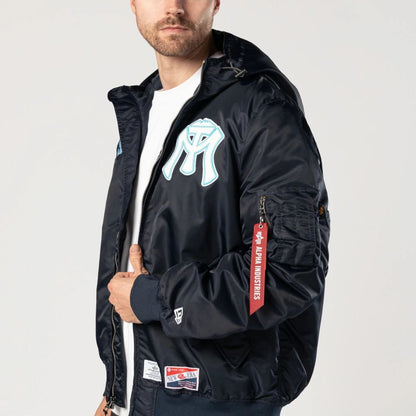 The Male model is wearing Sultanes De Monterrey LMB X Alpha Navy Jacket 3