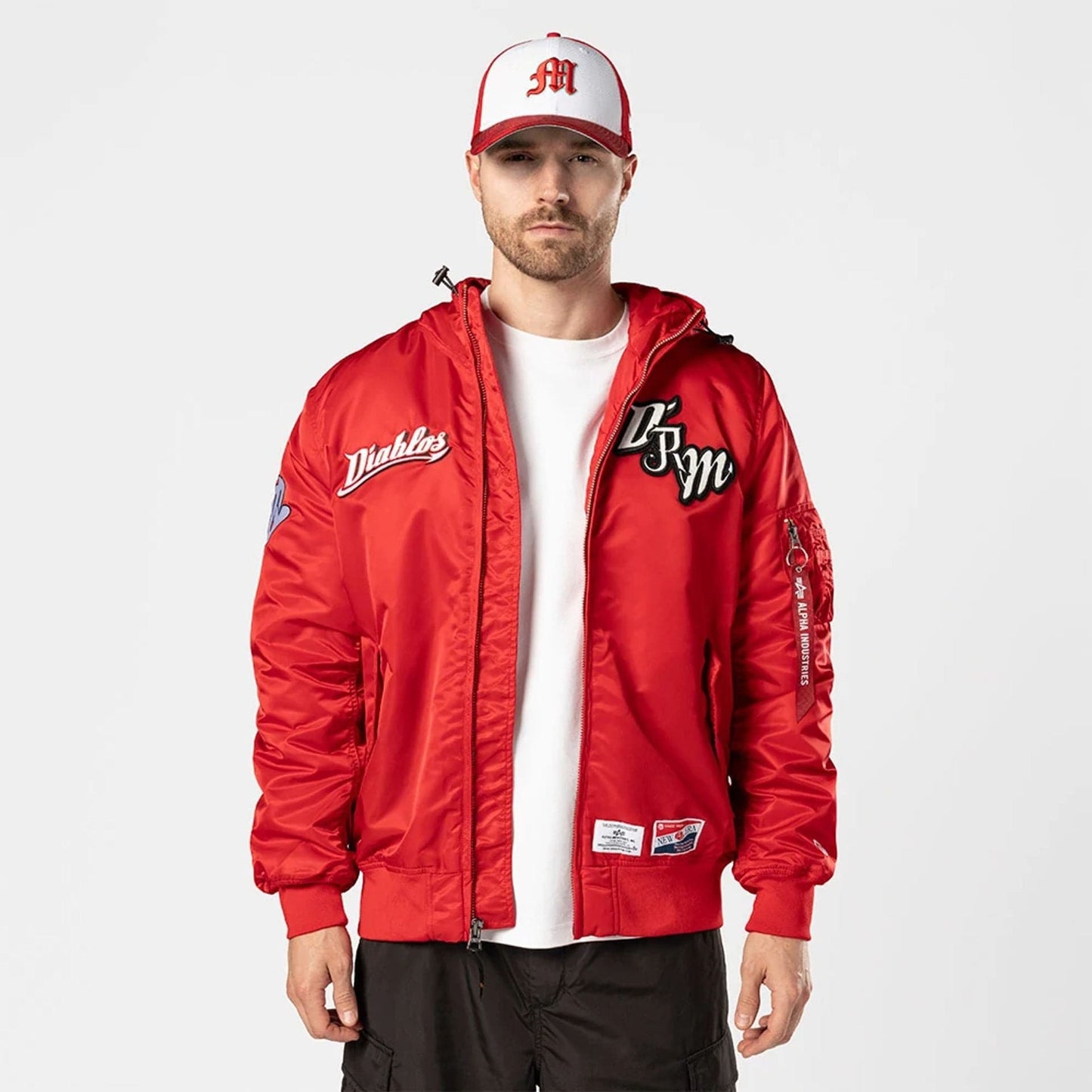 The Male model is wearing Mexico Diablos LMB X Alpha Red Jacket 1