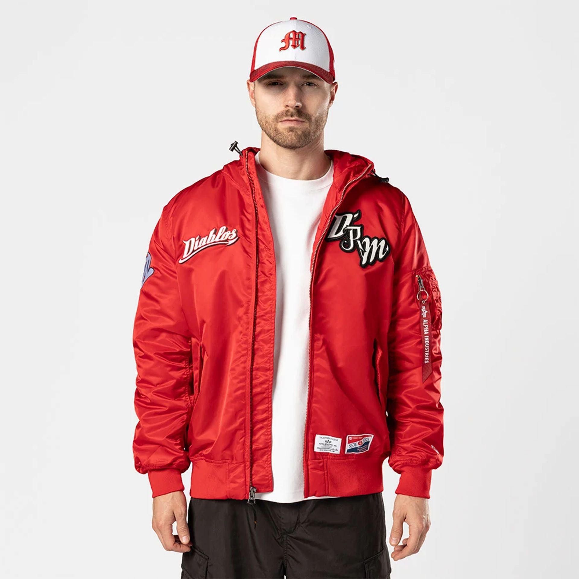 The Male model is wearing Mexico Diablos LMB X Alpha Red Jacket 1