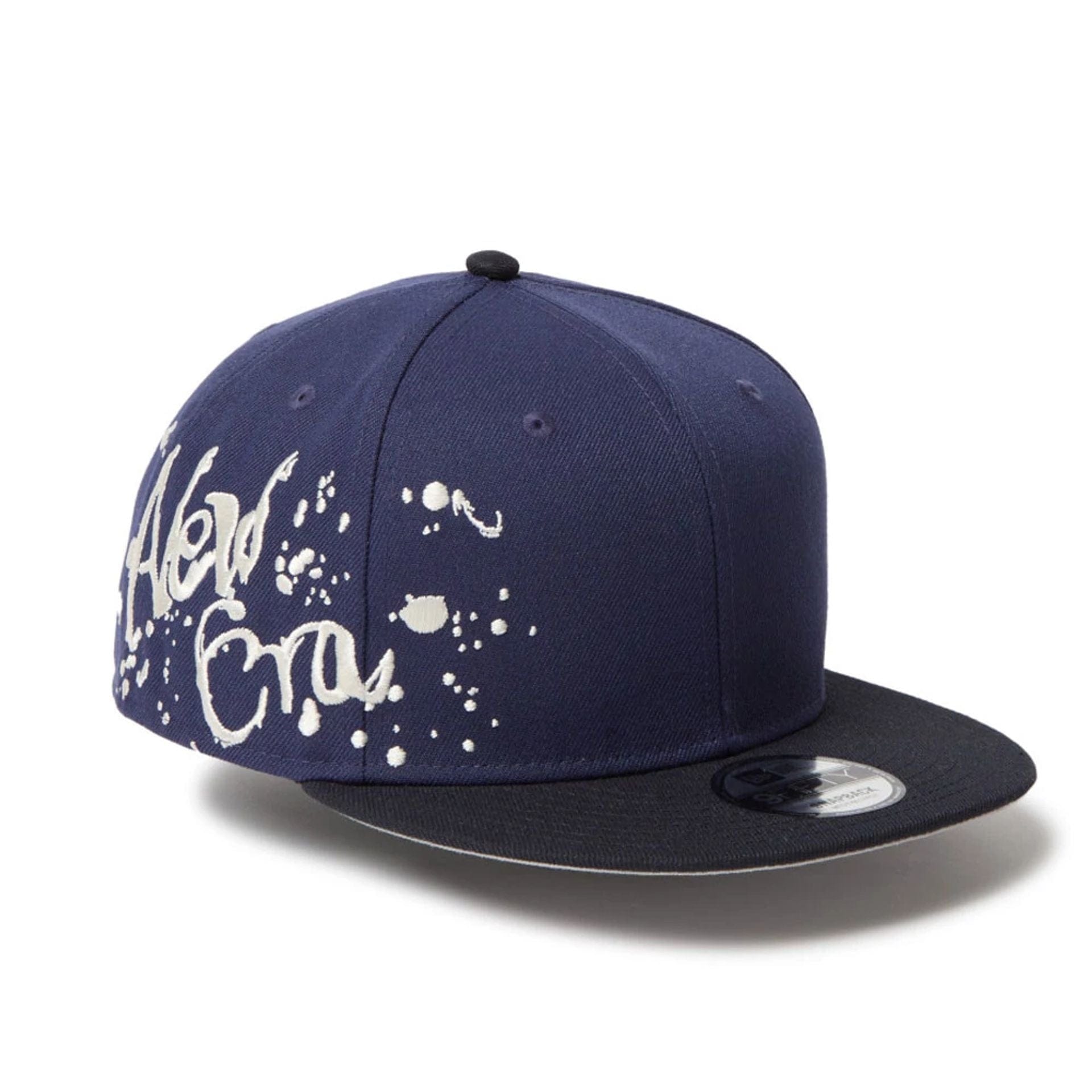 New Era Dripping Emblem Navy 9FIFTY Snapback Cap | NEC EU
