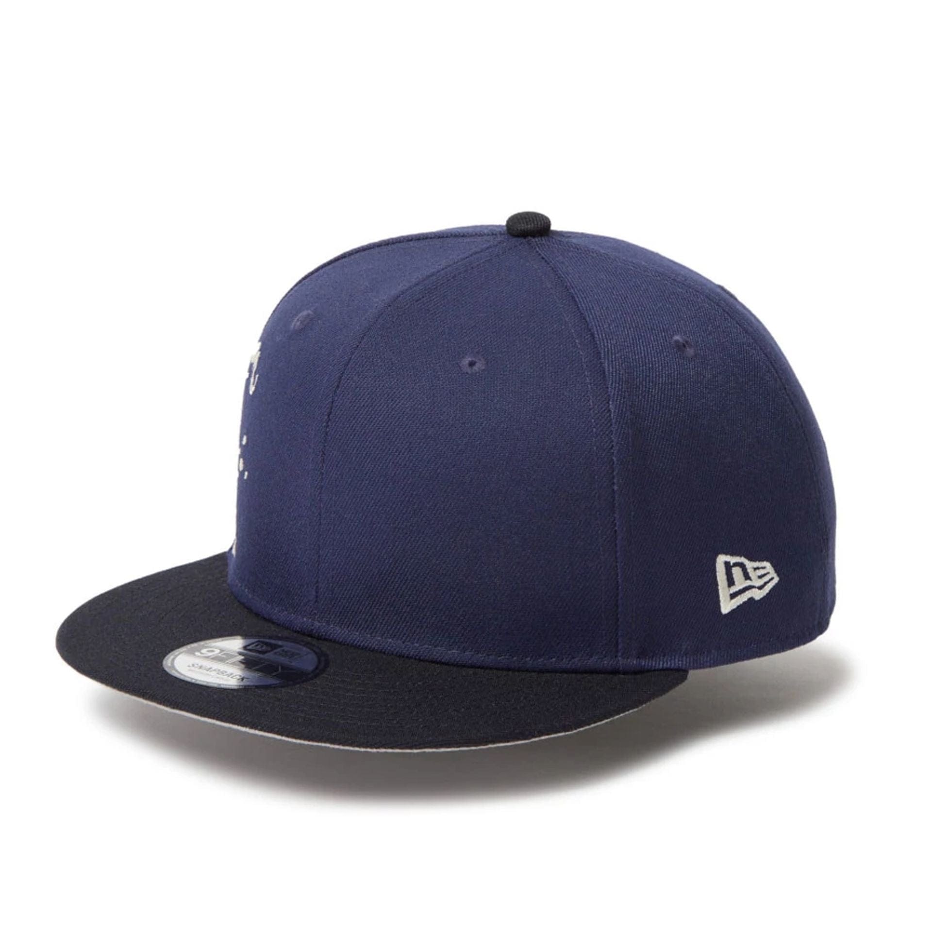 New Era Dripping Emblem Navy 9FIFTY Snapback Cap | NEC EU