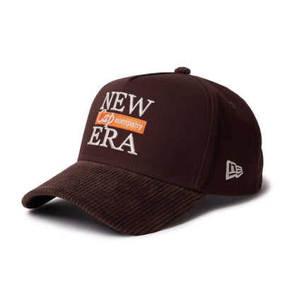 This is a  New Era Duck 2Tone Dark Brown 9FORTY A-Frame Adjustable Cap 1