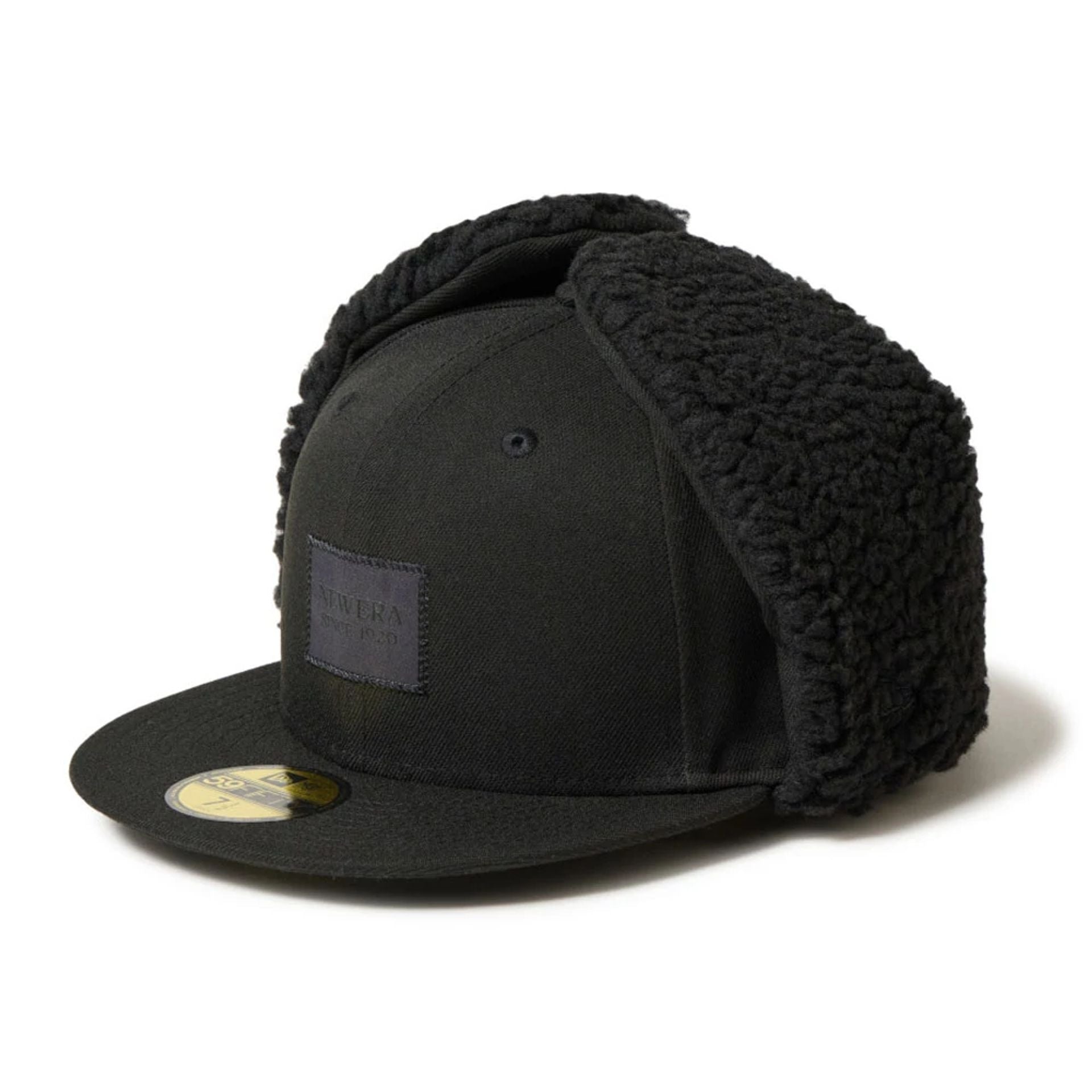 This is a New Era Patch Black Dogear 59FIFTY Fitted Cap 1