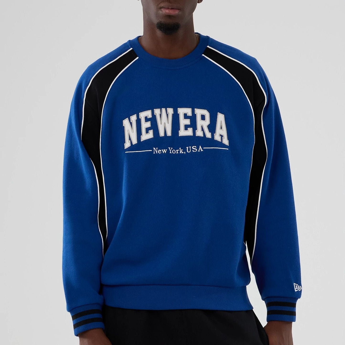 The Male model is wearing New Era Colour Block Navy Crew Neck Sweater 5