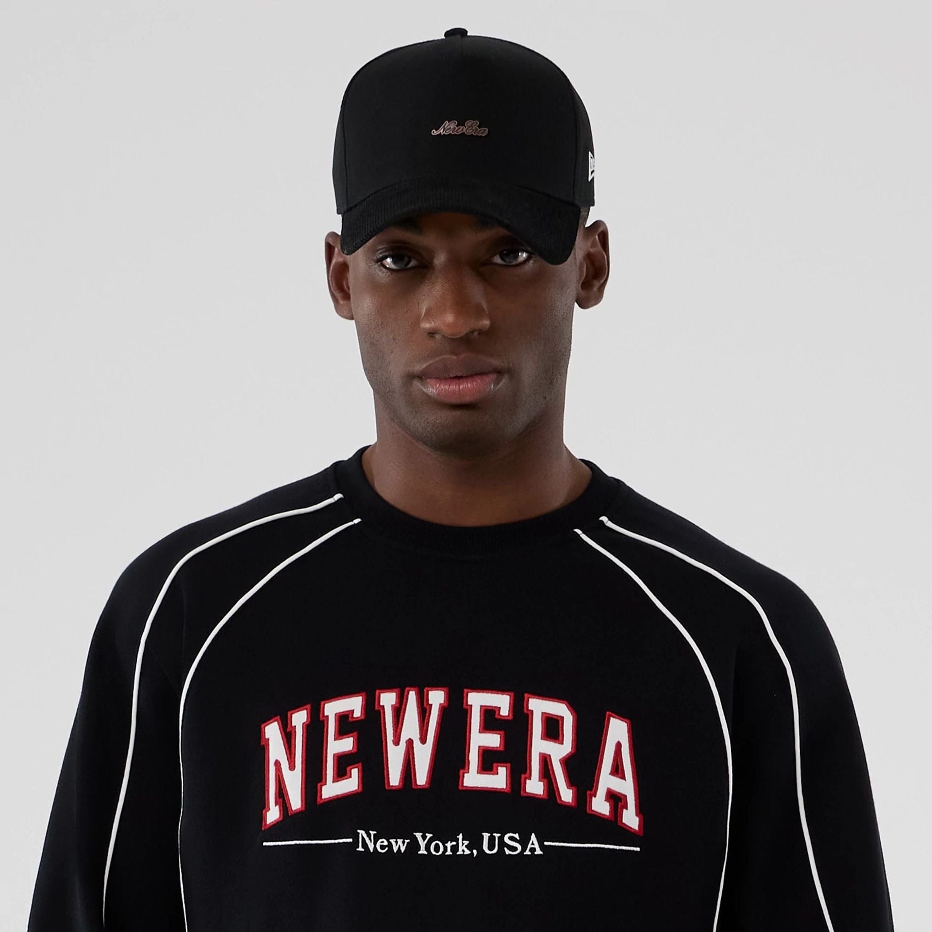 The Male model is wearing New Era Colour Block Black Crew Neck Sweater 5
