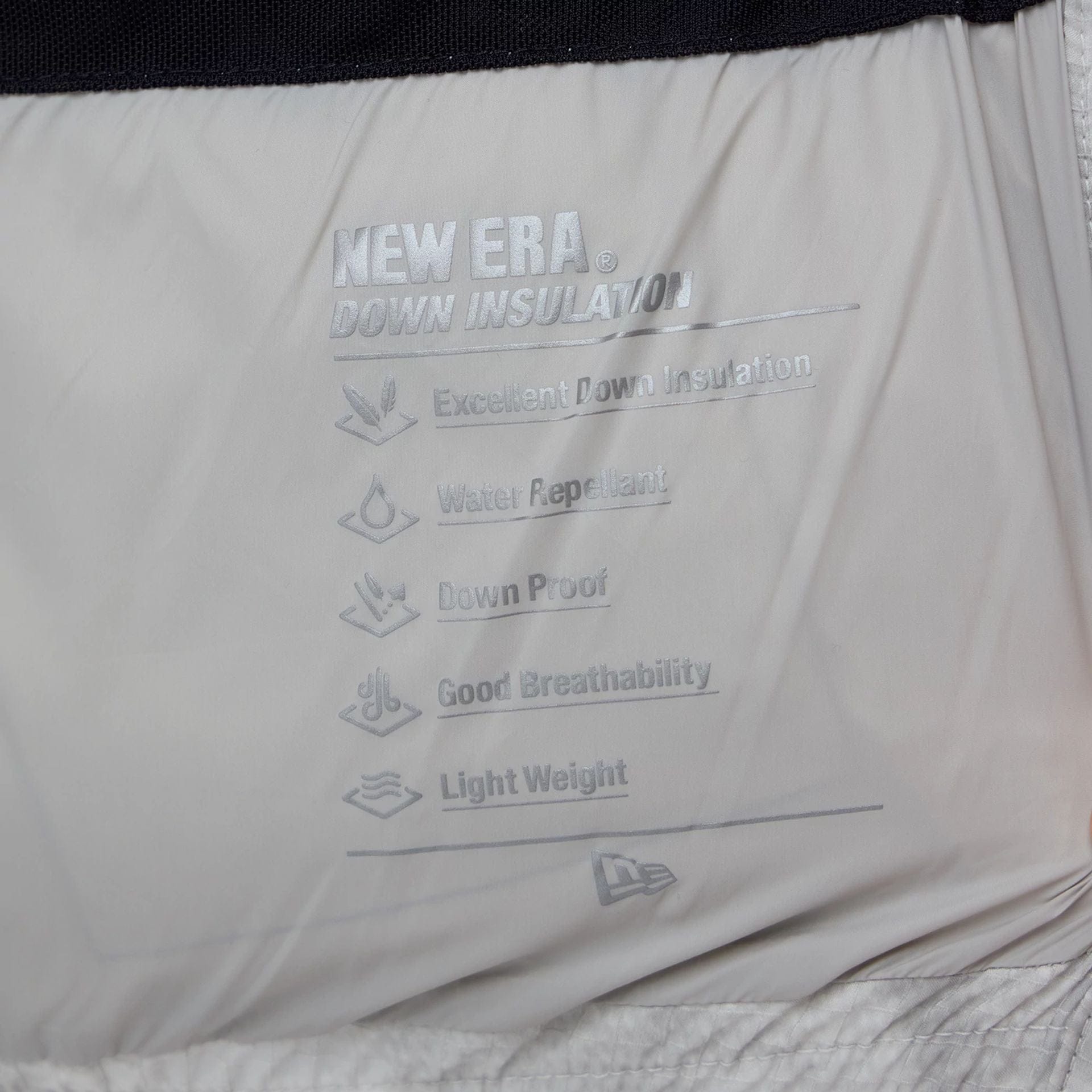 The Male model is wearing  New Era Outdoor Natural Down Jacket  4