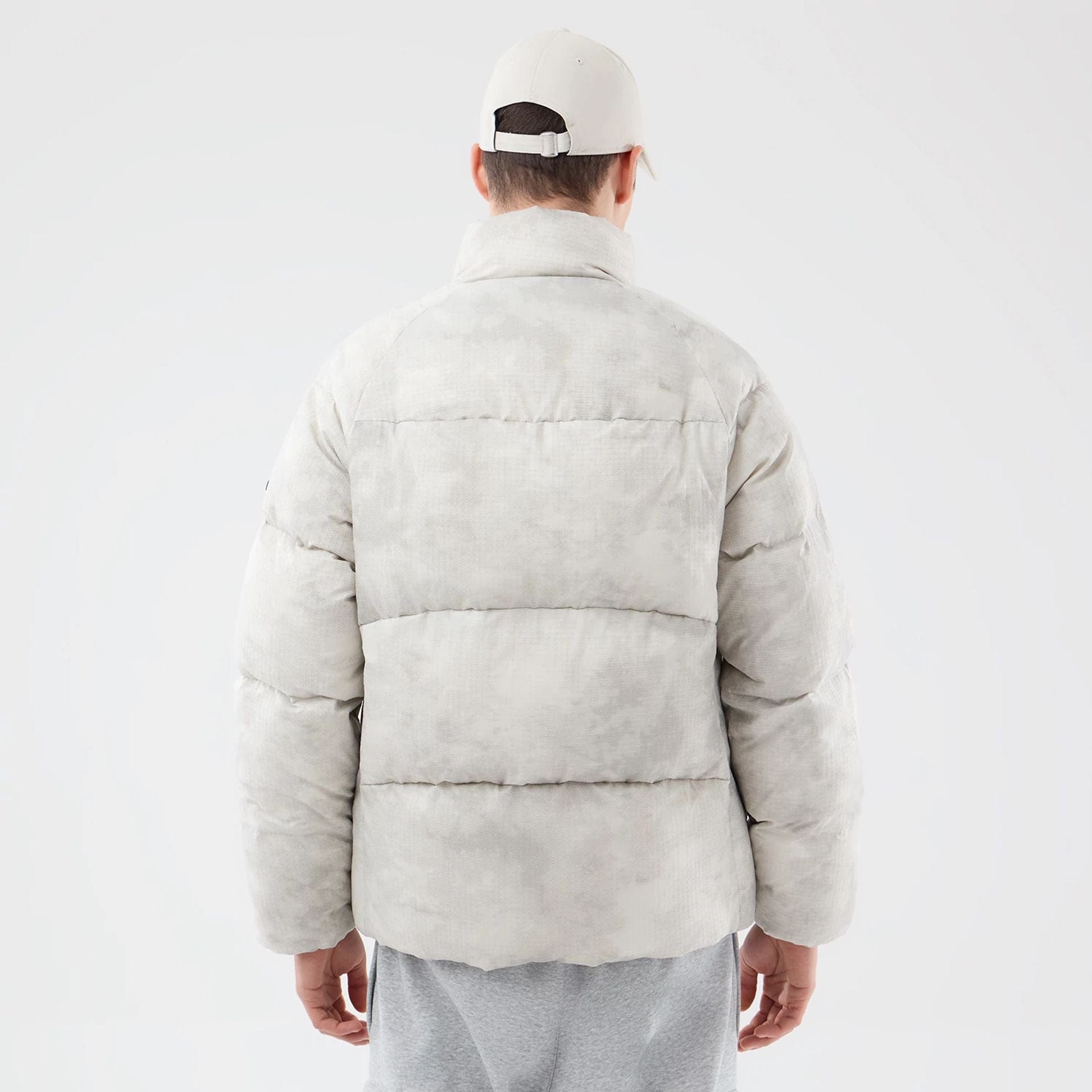 The Male model is wearing  New Era Outdoor Natural Down Jacket  2