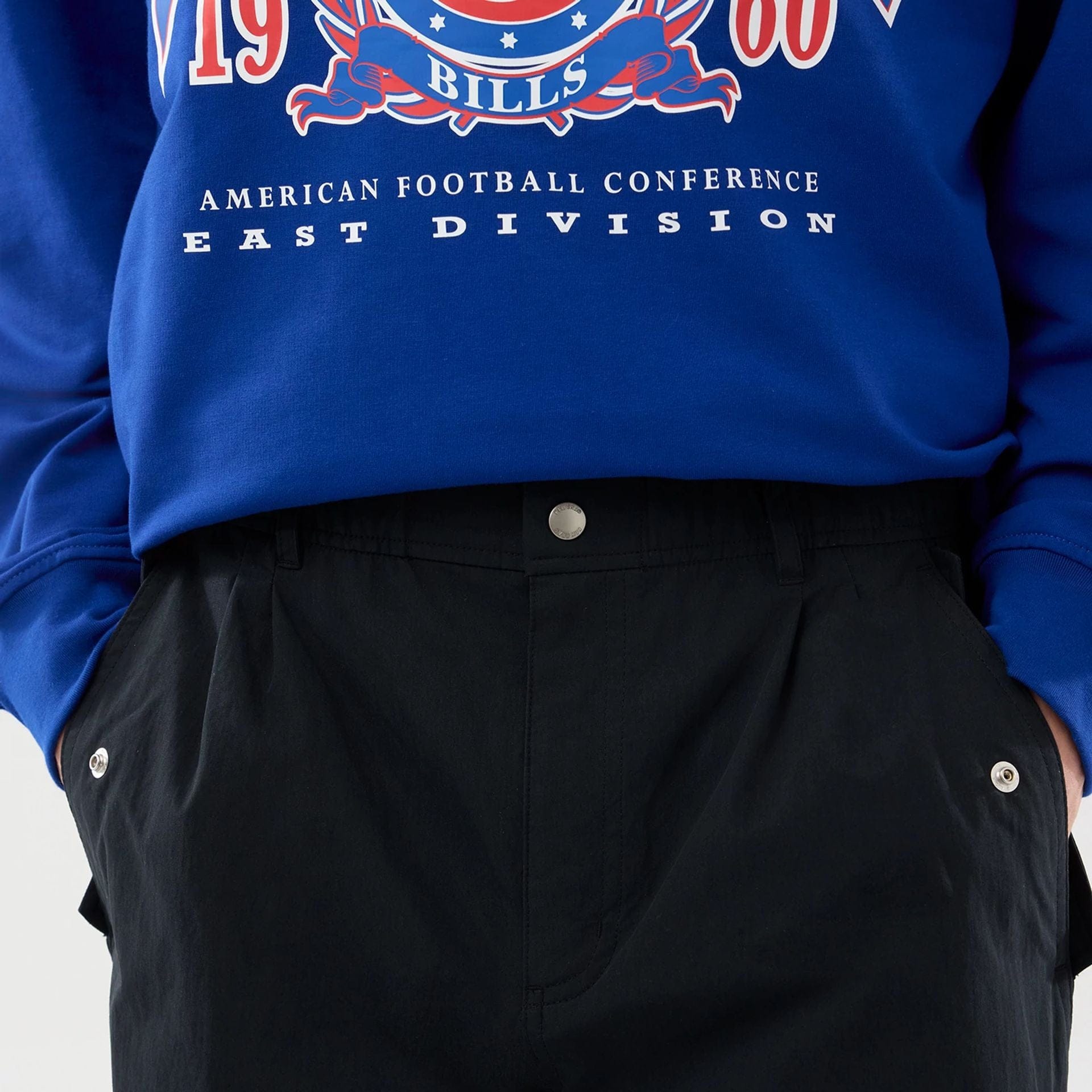 The Male model is wearing New Era Organic Black Parachute Trousers 3