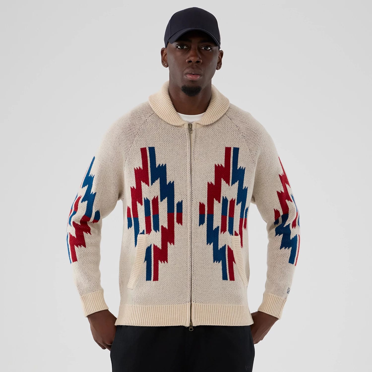 The Male model is wearing  New Era Organic Cowichan Natural Cardigan 1