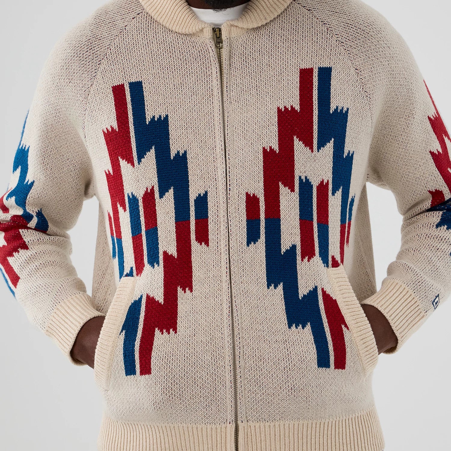 The Male model is wearing  New Era Organic Cowichan Natural Cardigan 3