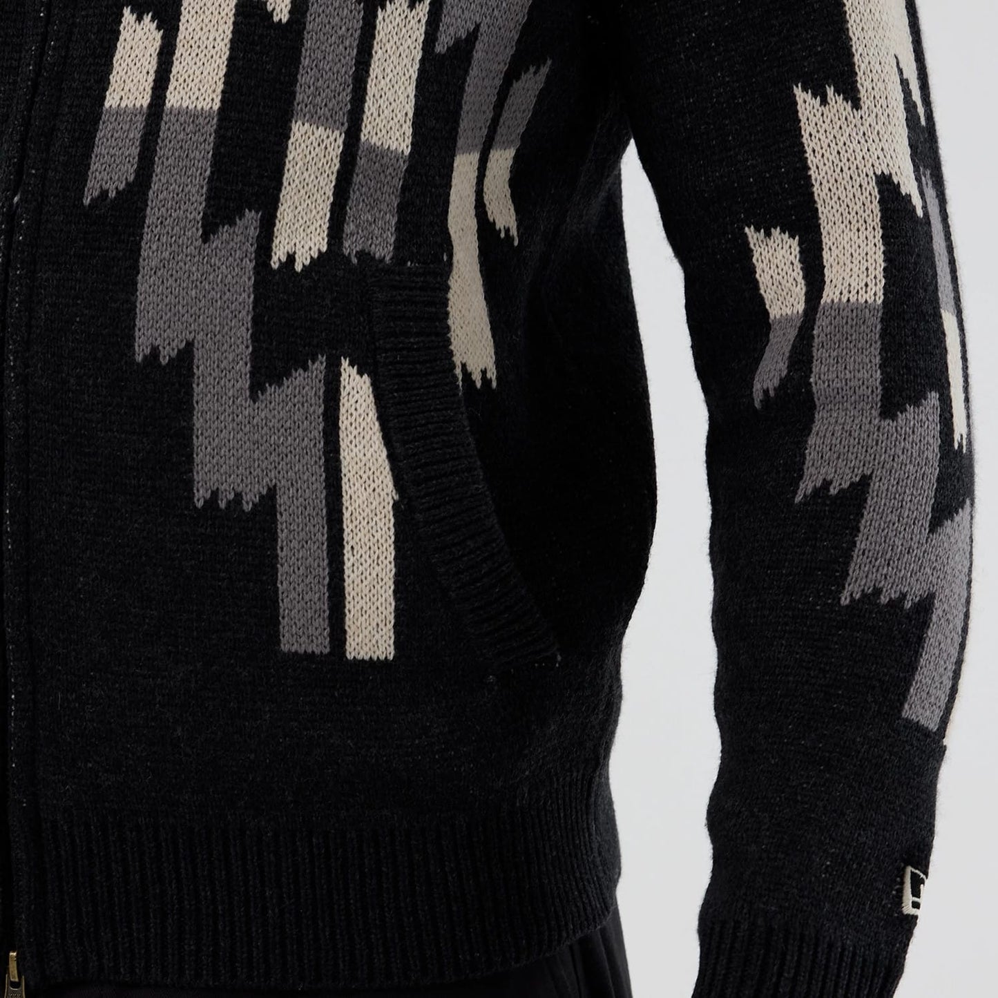 The Male model is wearing  New Era Organic Cowichan Black Cardigan 5