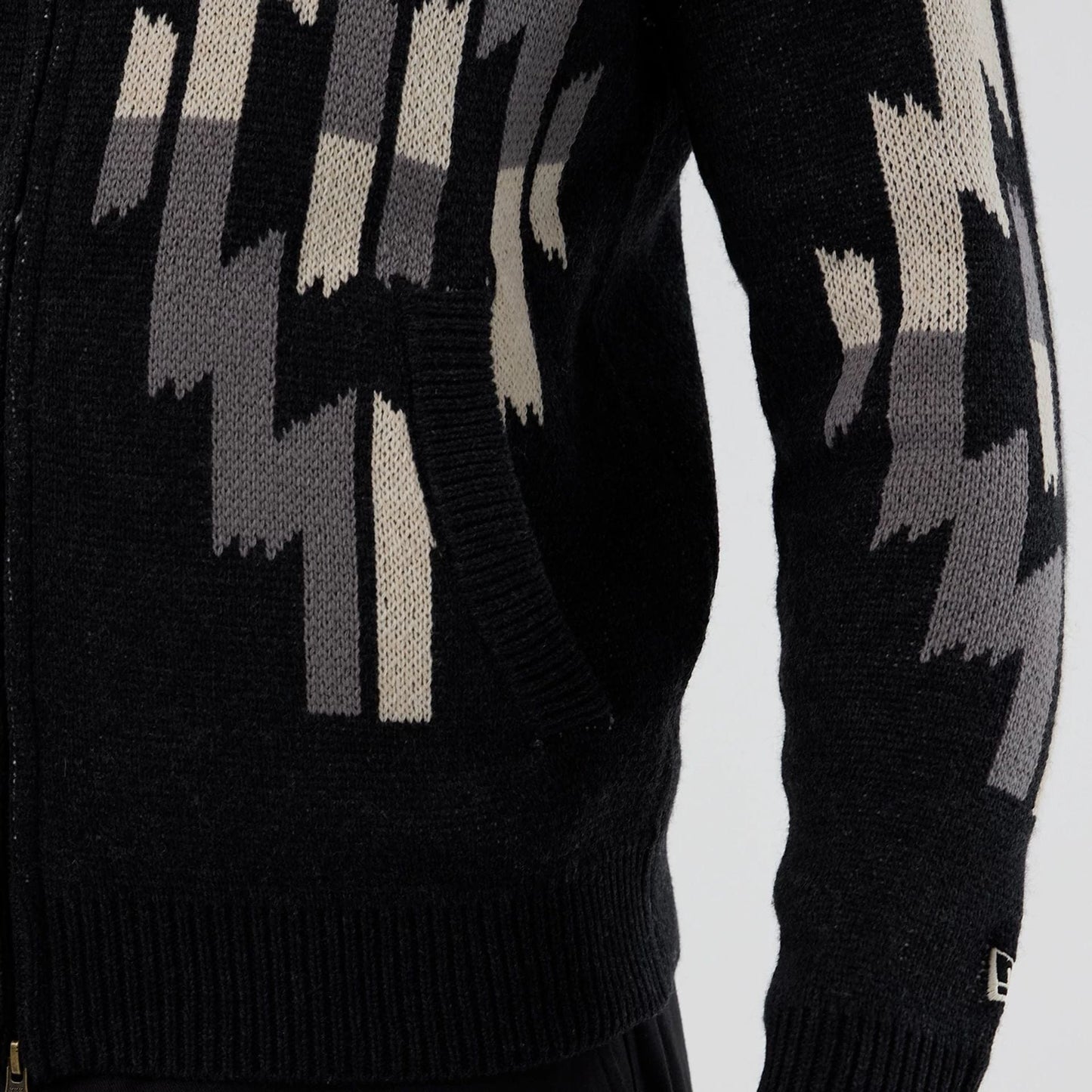 The Male model is wearing  New Era Organic Cowichan Black Cardigan  5