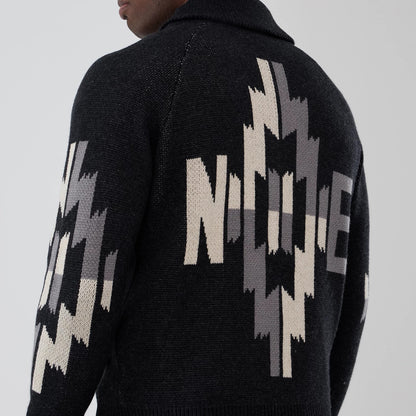 The Male model is wearing  New Era Organic Cowichan Black Cardigan 6