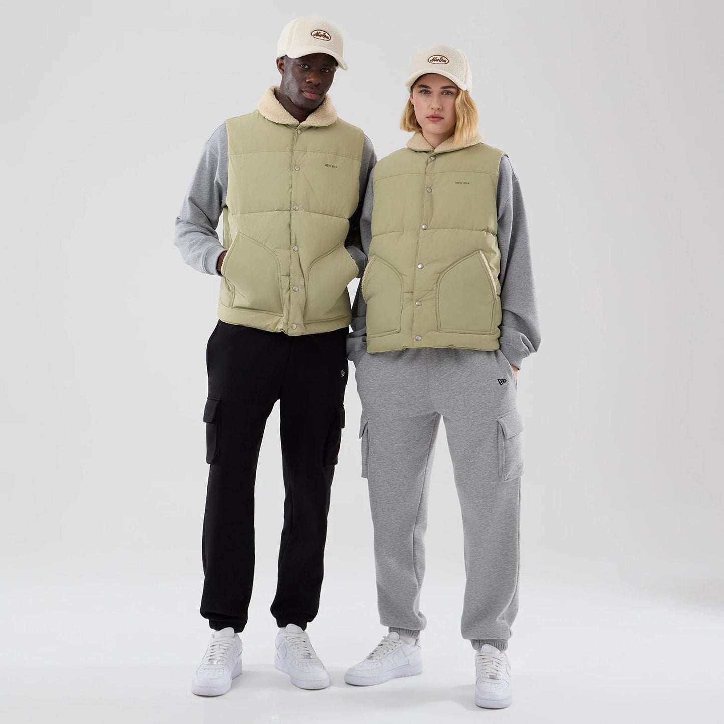 The Male model is wearing  New Era Organic Boa Neck Khaki Gilet  1