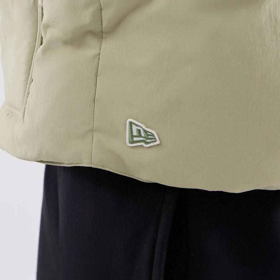 The Male model is wearing  New Era Organic Boa Neck Khaki Gilet  6