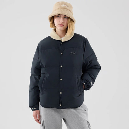 The Male model is wearing  New Era Organic Boa Neck Navy Jacket  4