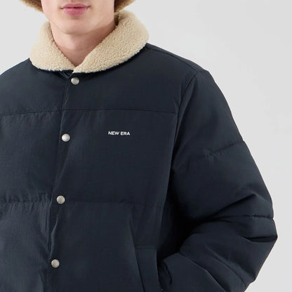 The Male model is wearing  New Era Organic Boa Neck Navy Jacket  5