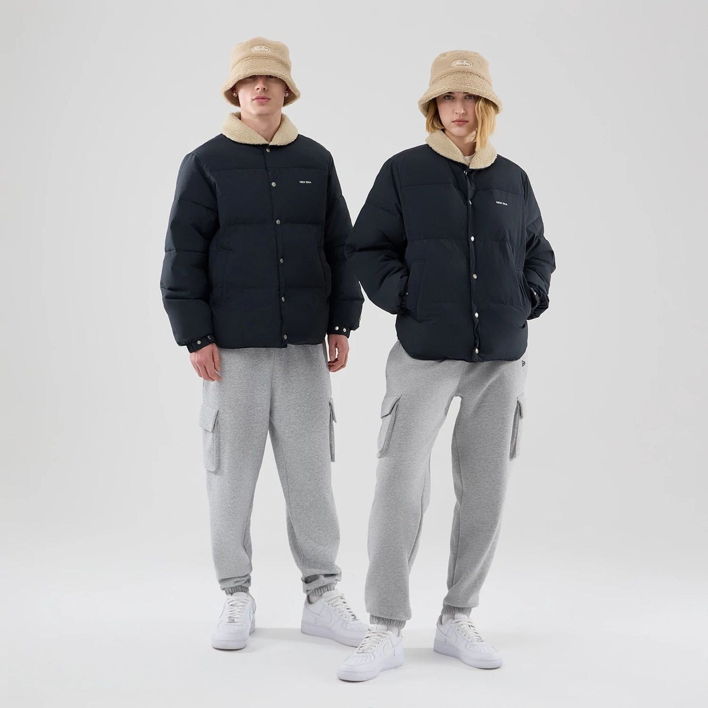 The Male model is wearing  New Era Organic Boa Neck Navy Jacket  1