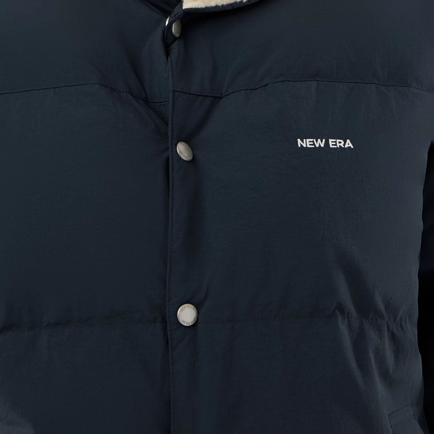 The Male model is wearing  New Era Organic Boa Neck Navy Jacket  6