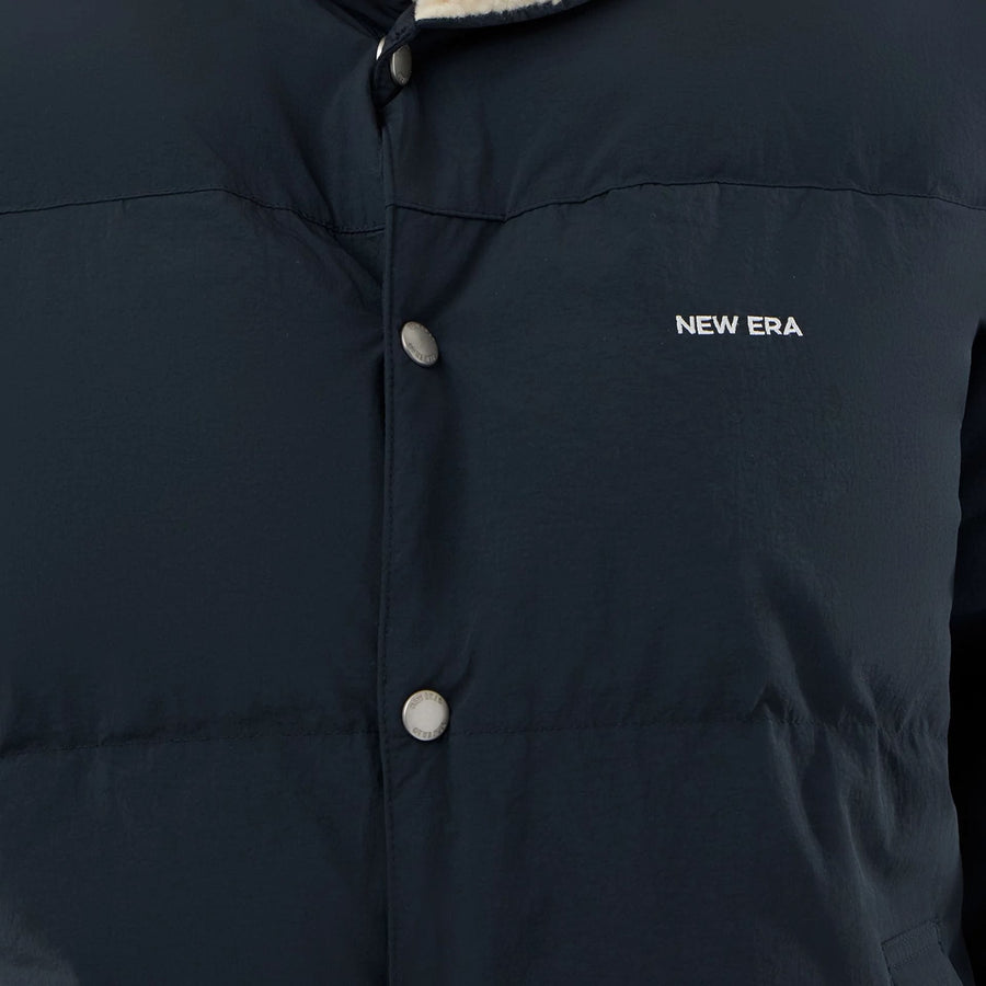 The Male model is wearing  New Era Organic Boa Neck Navy Jacket  6