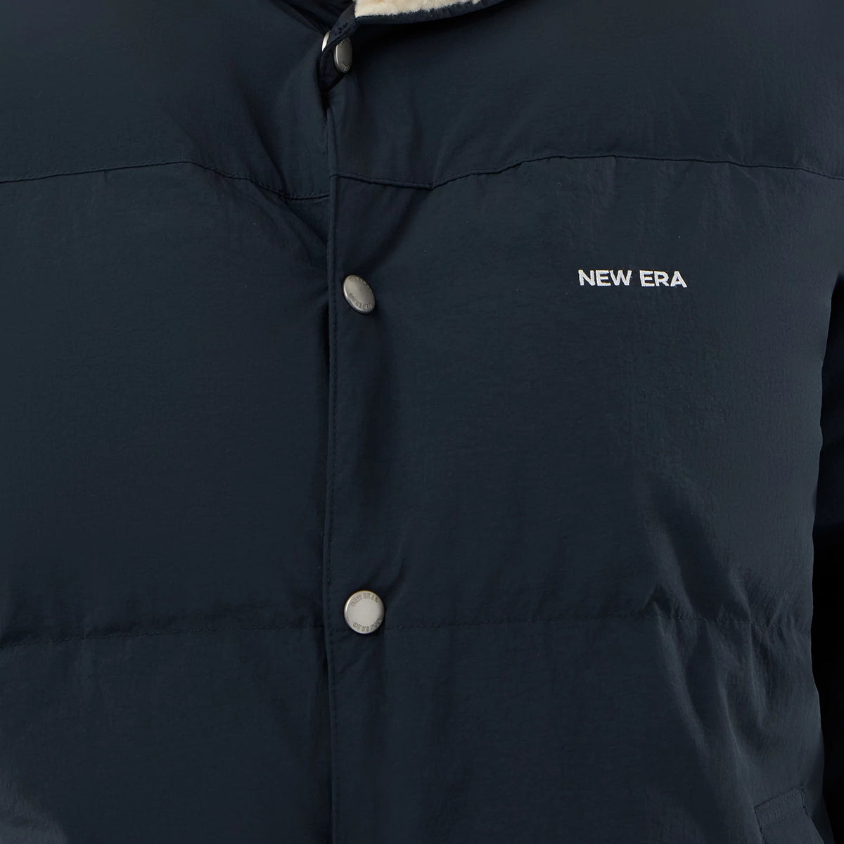 The Male model is wearing  New Era Organic Boa Neck Navy Jacket 6