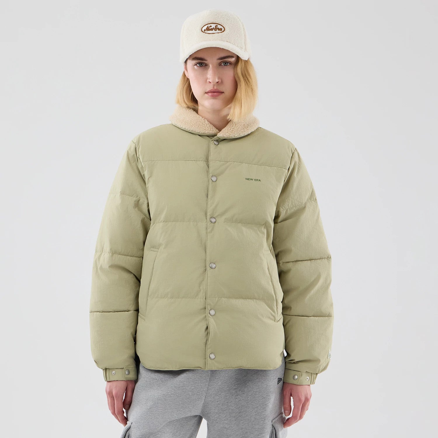 The Male model is wearing  New Era Organic Boa Neck Khaki Jacket 4