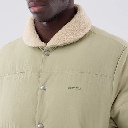 The Male model is wearing  New Era Organic Boa Neck Khaki Jacket 5