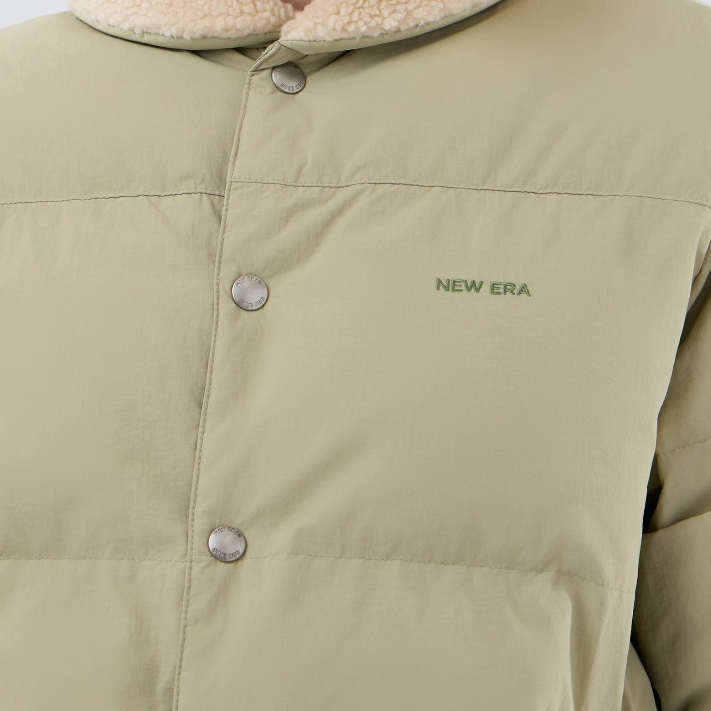 The Male model is wearing  New Era Organic Boa Neck Khaki Jacket 6