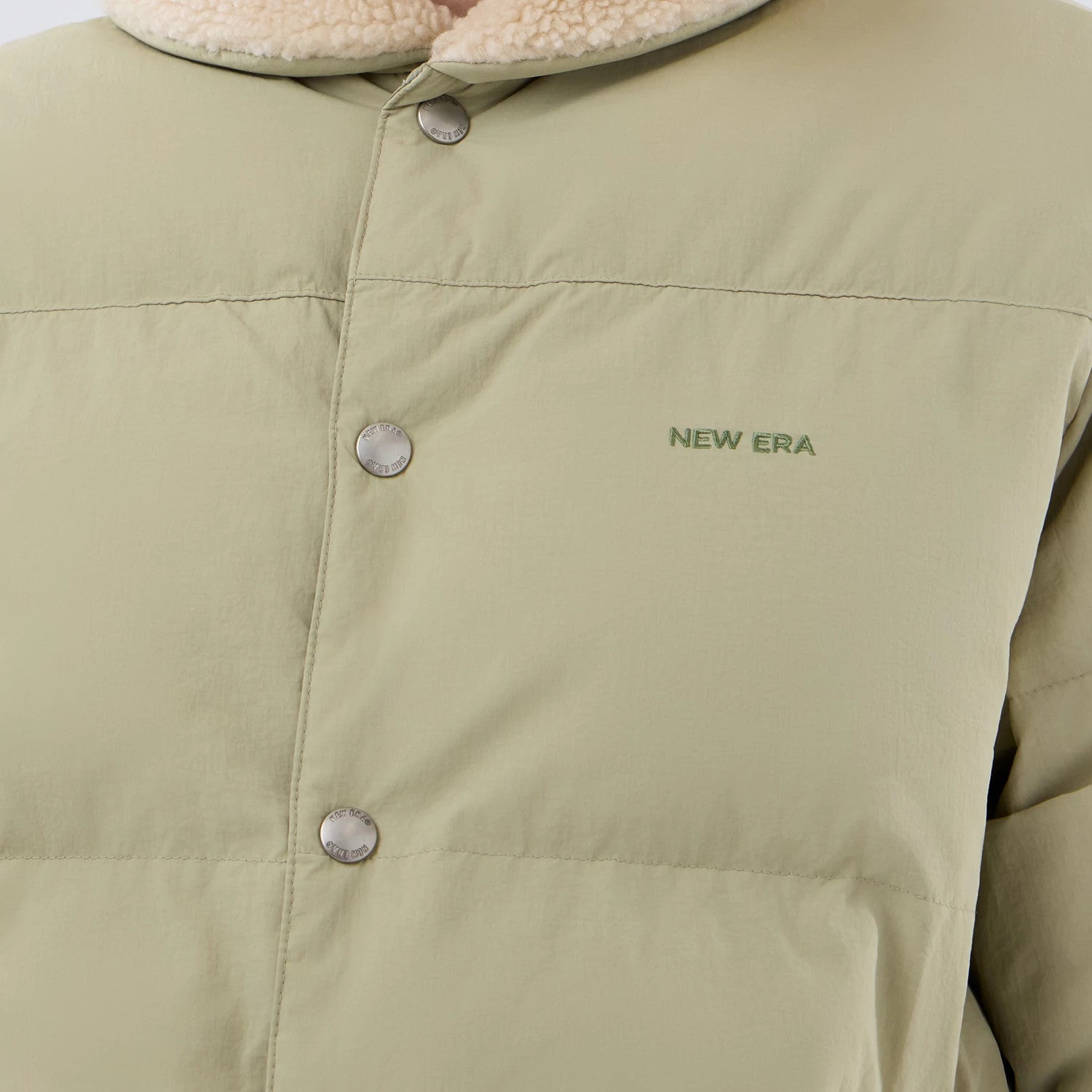 The Male model is wearing  New Era Organic Boa Neck Khaki Jacket 6