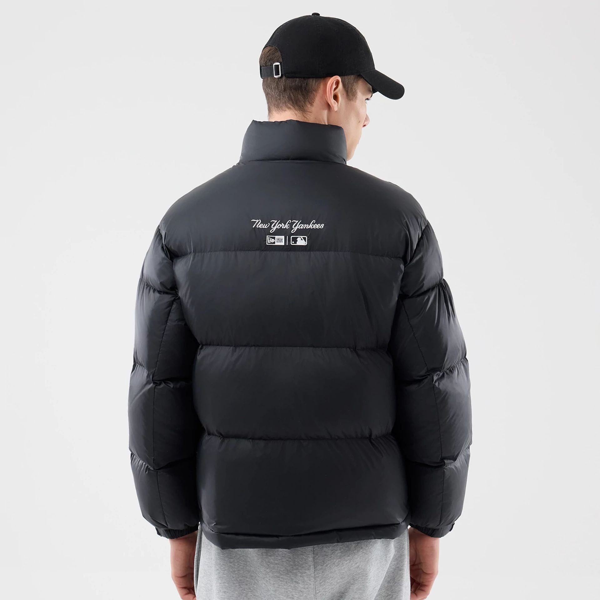 The Male model is wearing New York Yankees MLB Black Puffer Down Jacket  2