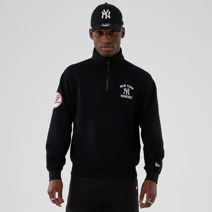 The Male model is wearing New York Yankees MLB Black 1/4 Zip Sweater 1