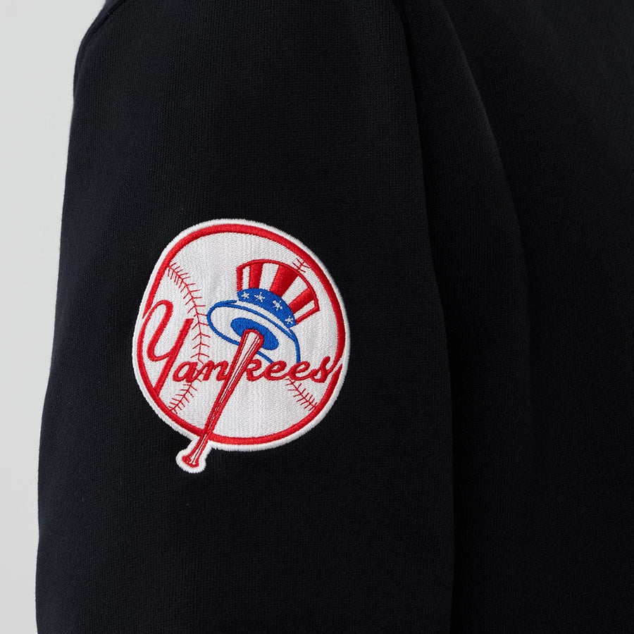 The Male model is wearing New York Yankees MLB Black 1/4 Zip Sweater 4