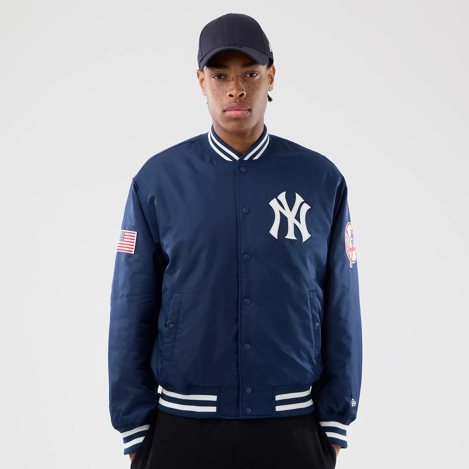 The Male model is wearing New York Yankees MLB Authentic Navy Stadium Jacket  1