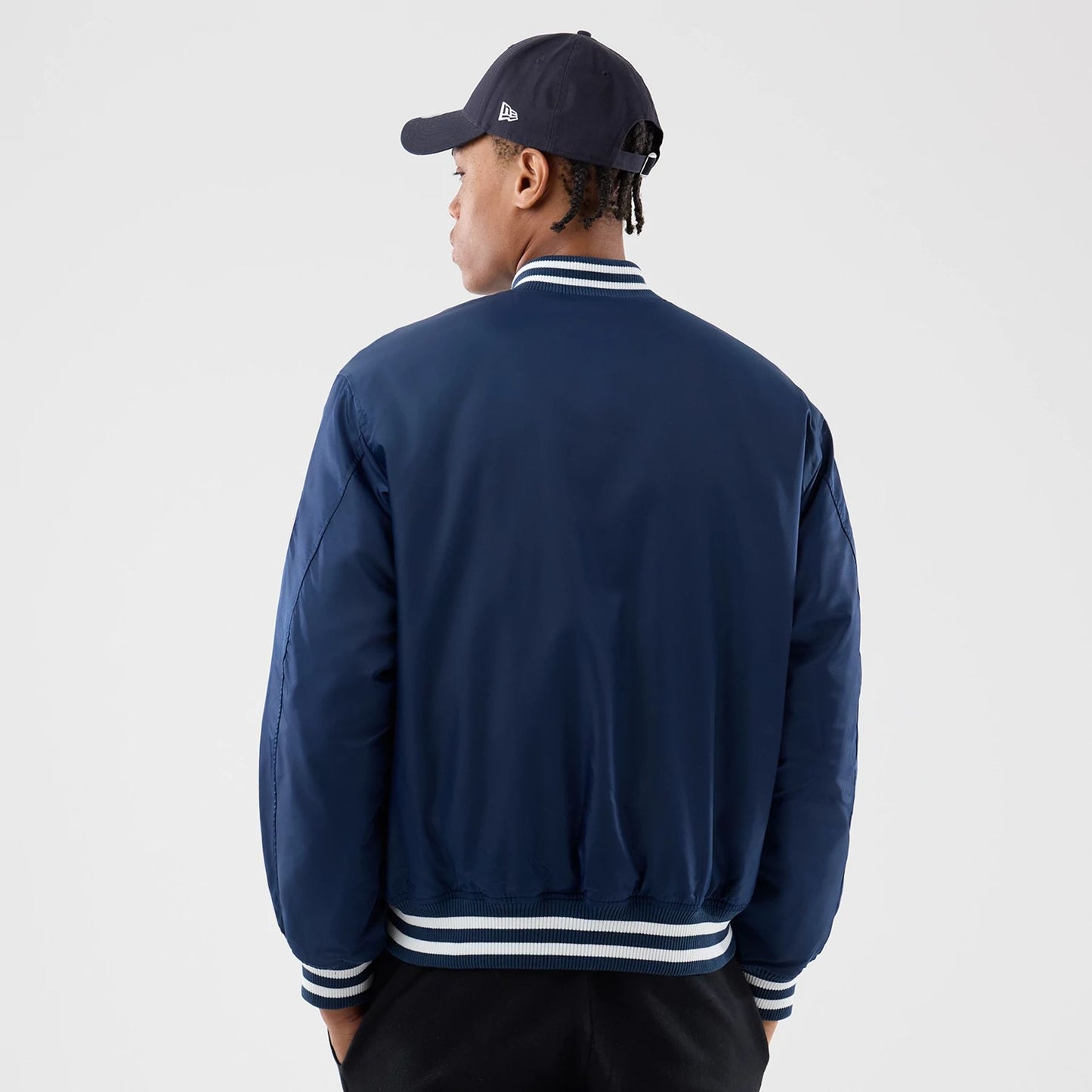 The Male model is wearing New York Yankees MLB Authentic Navy Stadium Jacket  2