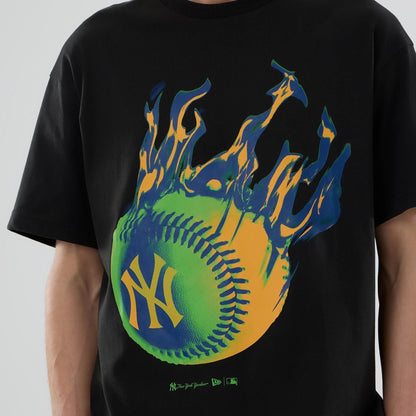The model is wearing this MLB On Fire New York Yankees Oversized T-Shirt in black. 3