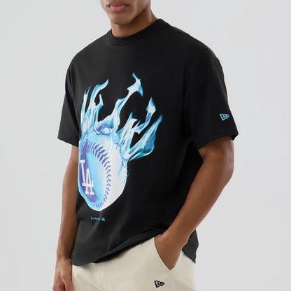 The model is wearing this MLB On Fire LA Dodgers Oversized T-Shirt in black. 3