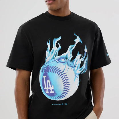 The model is wearing this MLB On Fire LA Dodgers Oversized T-Shirt in black. 4