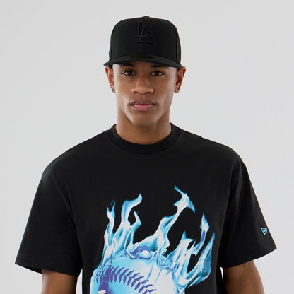 The model is wearing this MLB On Fire LA Dodgers Oversized T-Shirt in black. 6
