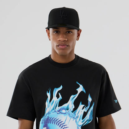 The model is wearing this MLB On Fire LA Dodgers Oversized T-Shirt in black. 6