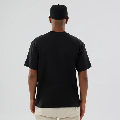 The model is wearing this MLB On Fire LA Dodgers Oversized T-Shirt in black. 2