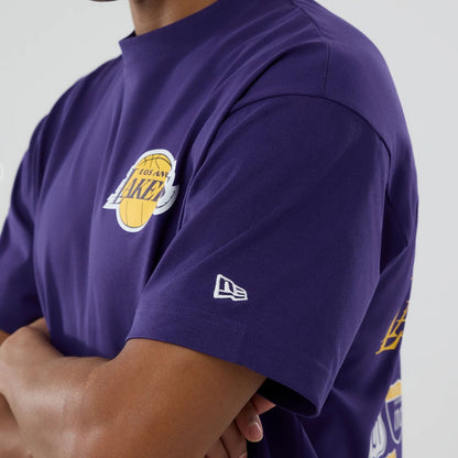 The model is wearing this NBA logo LA Lakers T-Shirt in purple. 5
