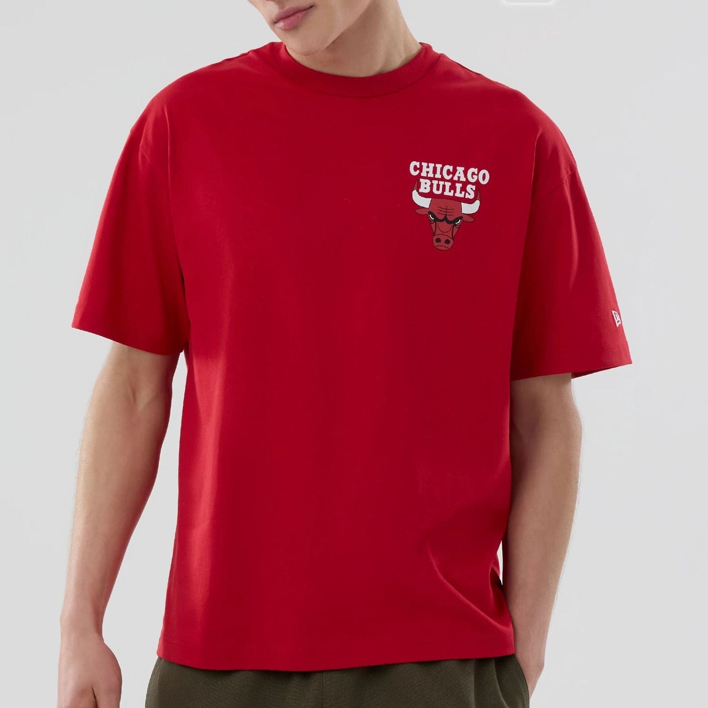 The model is wearing this NBA logo Chicago Bulls T-Shirt in red. 5
