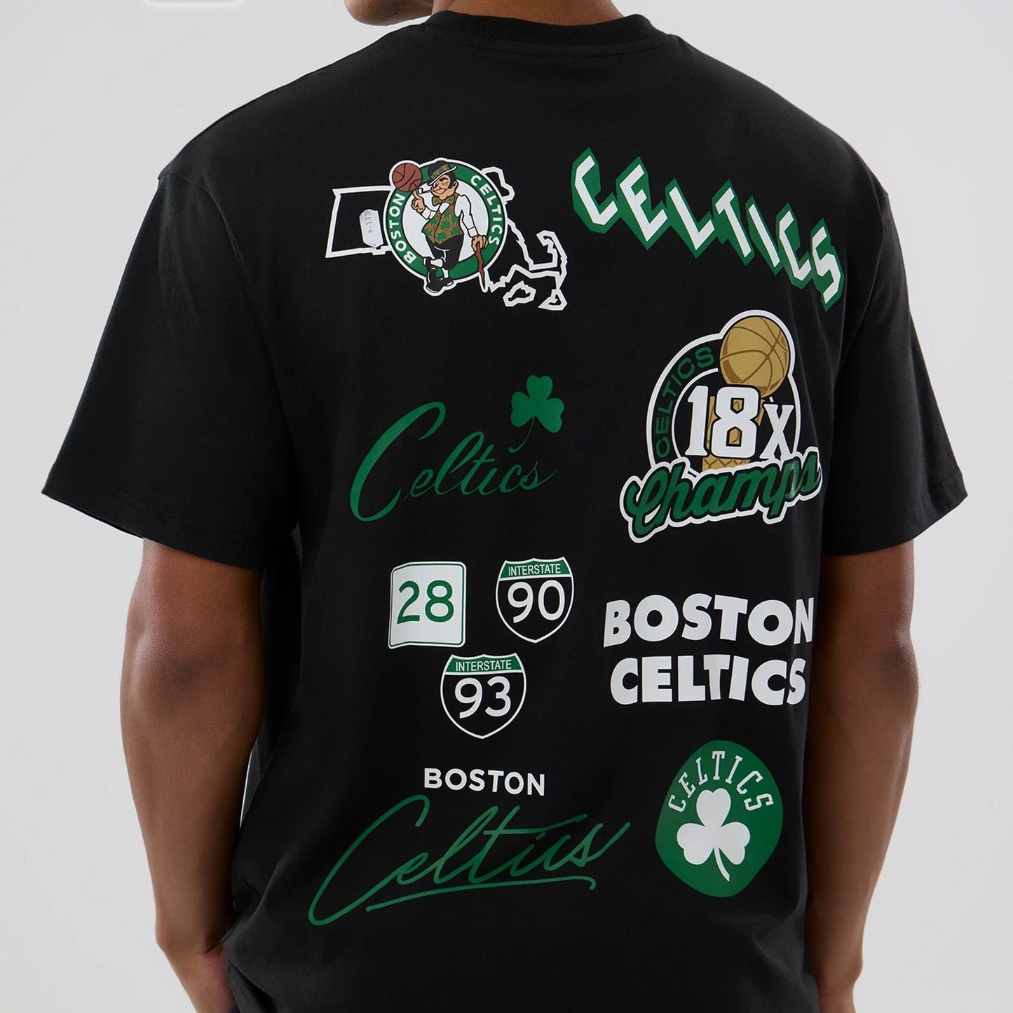 The model is wearing this NBA logo Boston Celtics T-Shirt in black. 3