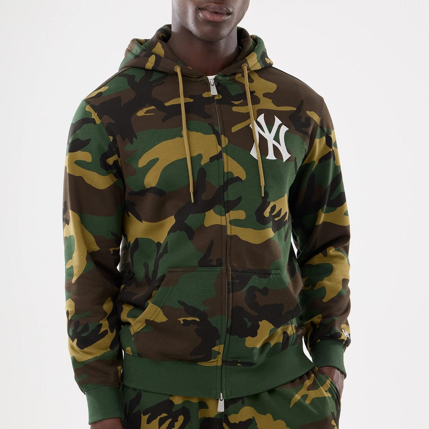 The model is wearing this MLB Camo New York Yankees 2 Way Full Zip Hoodie in Woodland Camo. 4