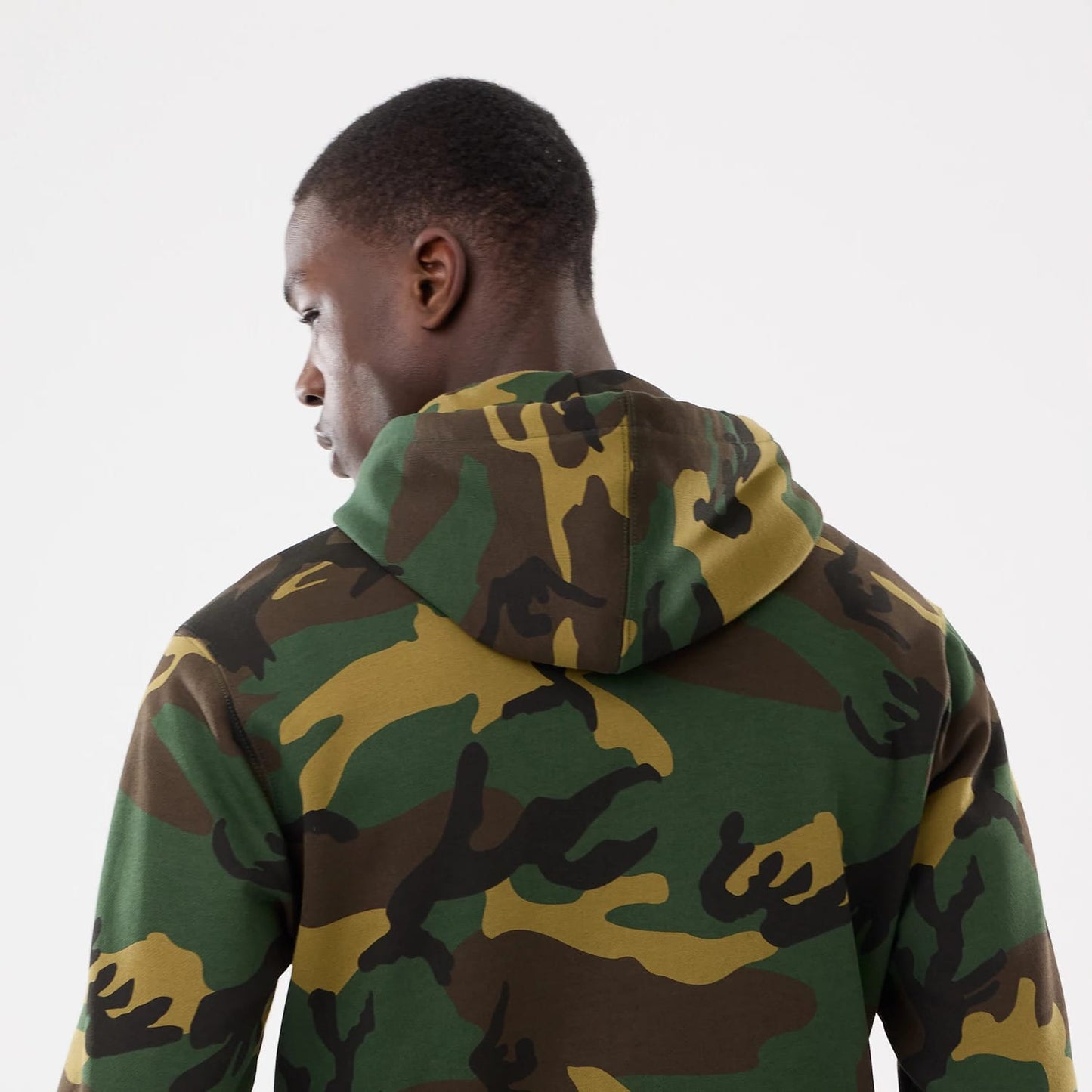 The model is wearing this MLB Camo New York Yankees 2 Way Full Zip Hoodie in Woodland Camo. 6