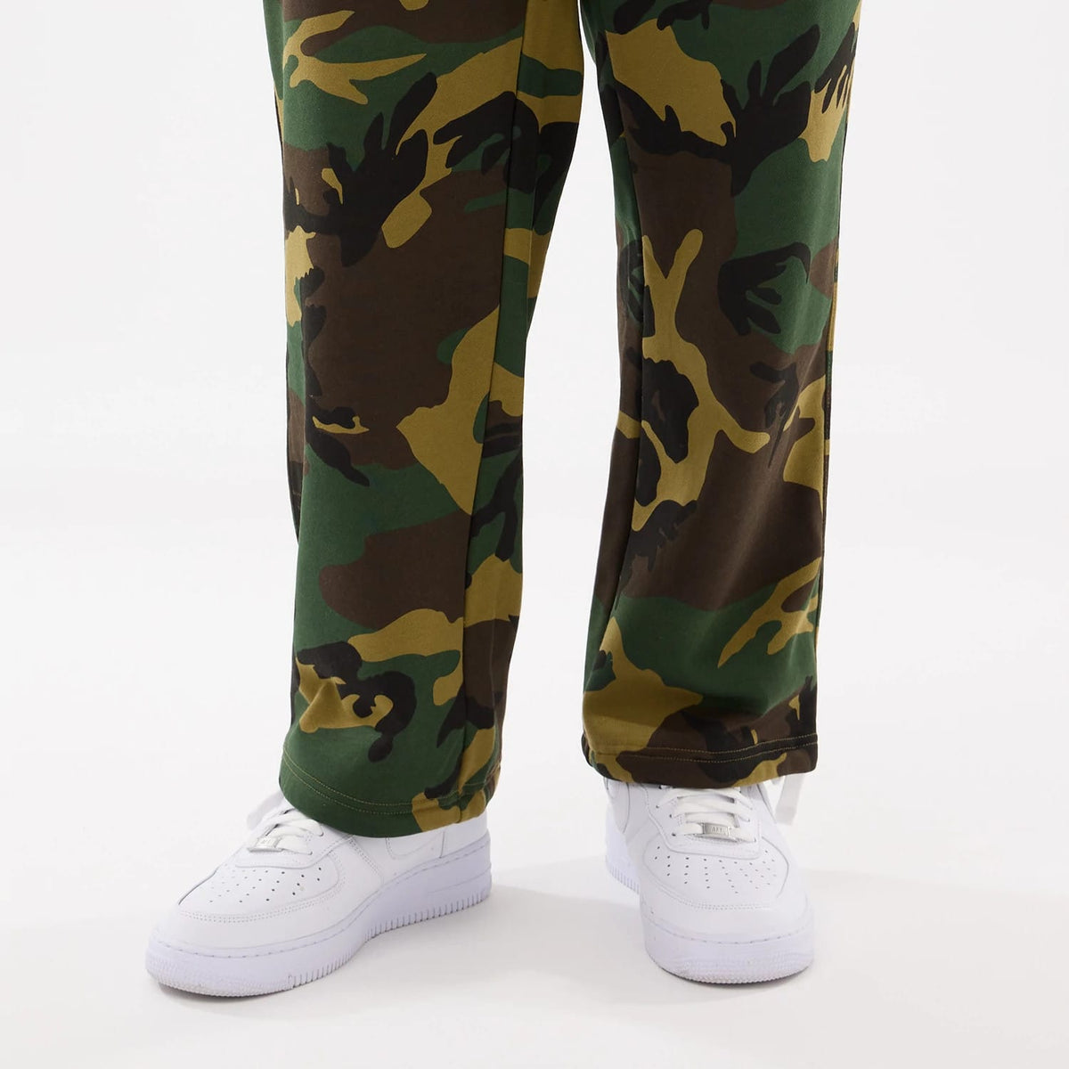 The model is wearing this New Era Woodland Camo Joggers in Woodland Camo. 7