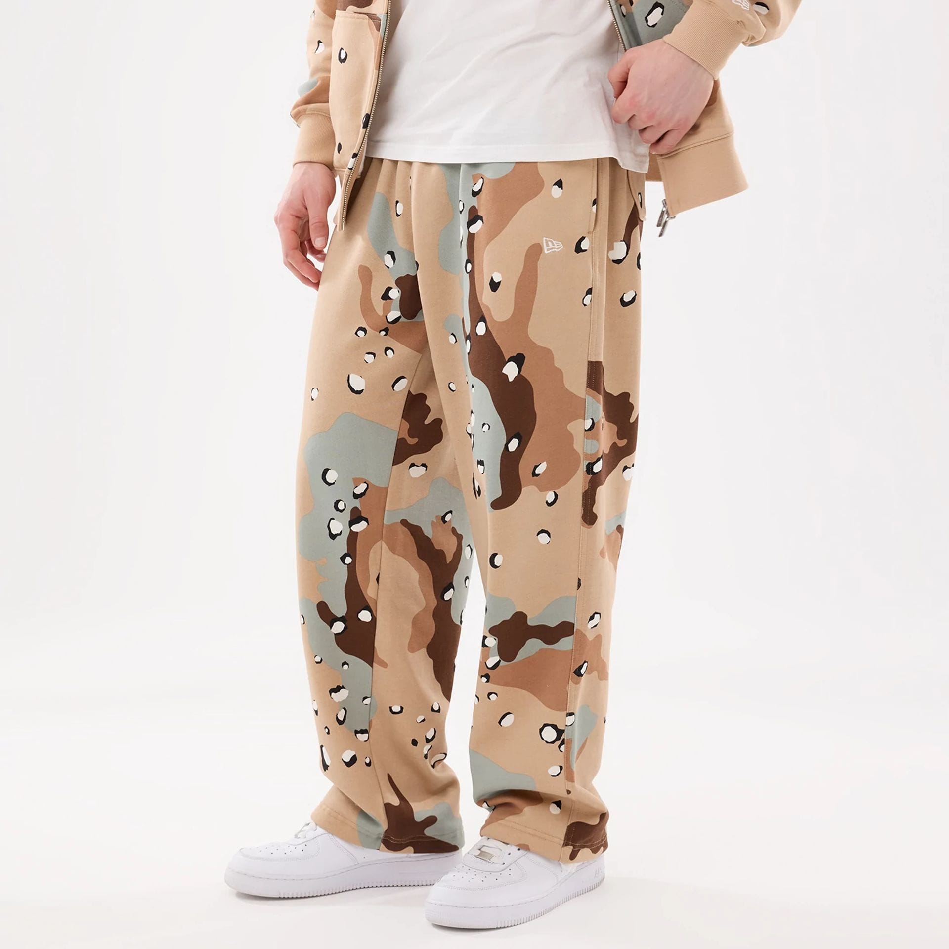 The model is wearing these New Era Desert Camo Joggers. 7